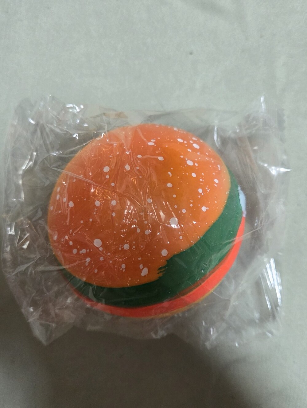 Orange and Green Party Squishy Bun Toy - Unbranded